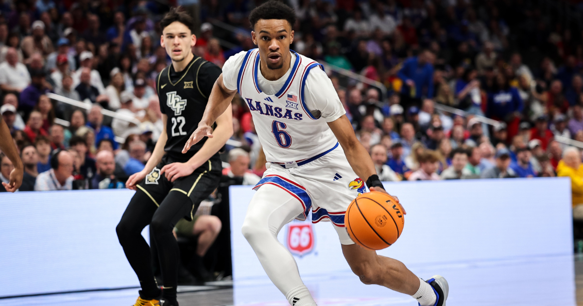 Mar 12, 2025; Kansas City, MO, USA; Kansas Jayhawks guard Rylan Griffen (6) drives to the basket during the first half against the UCF Knights at T-Mobile Center. Mandatory Credit: William Purnell-Imagn Images