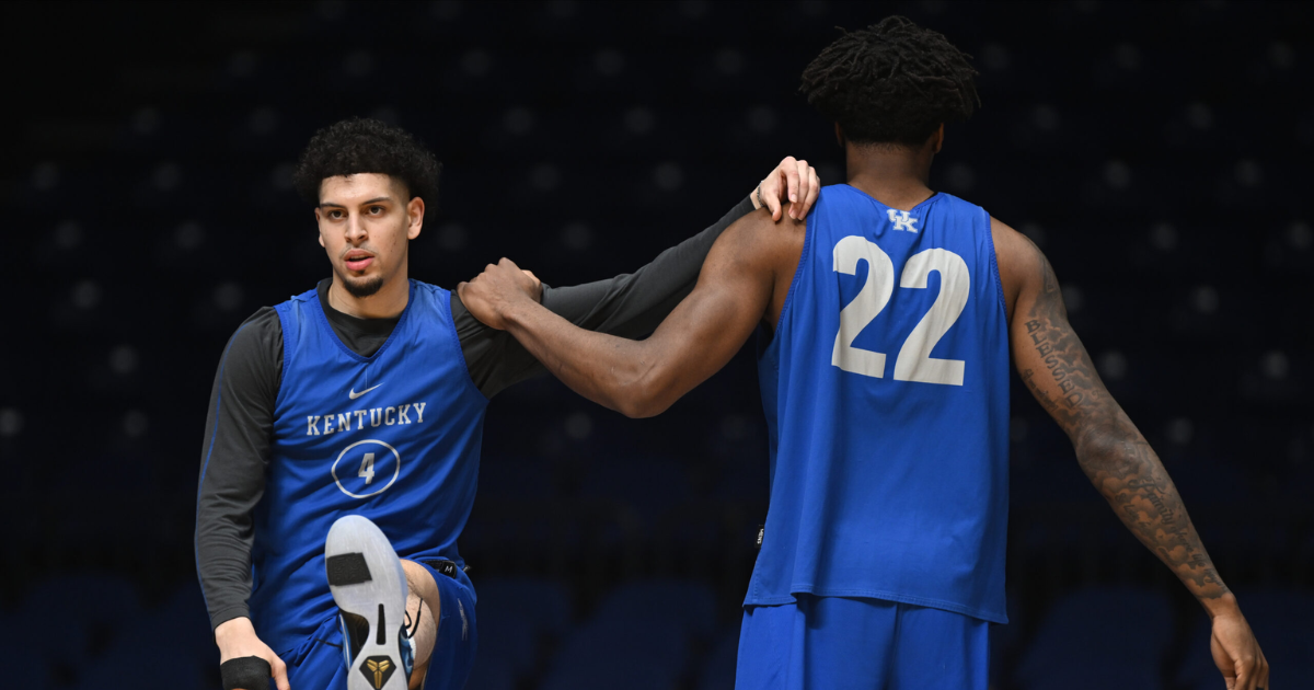 Mar 27, 2025; Indianapolis, IN, USA; Kentucky Wildcats guard Koby Brea (4) and Kentucky Wildcats center Amari Williams (22) stretch during the NCAA tournament midwest regional practice day at Lucas Oil Stadium. Mandatory Credit: Robert Goddin-Imagn Images