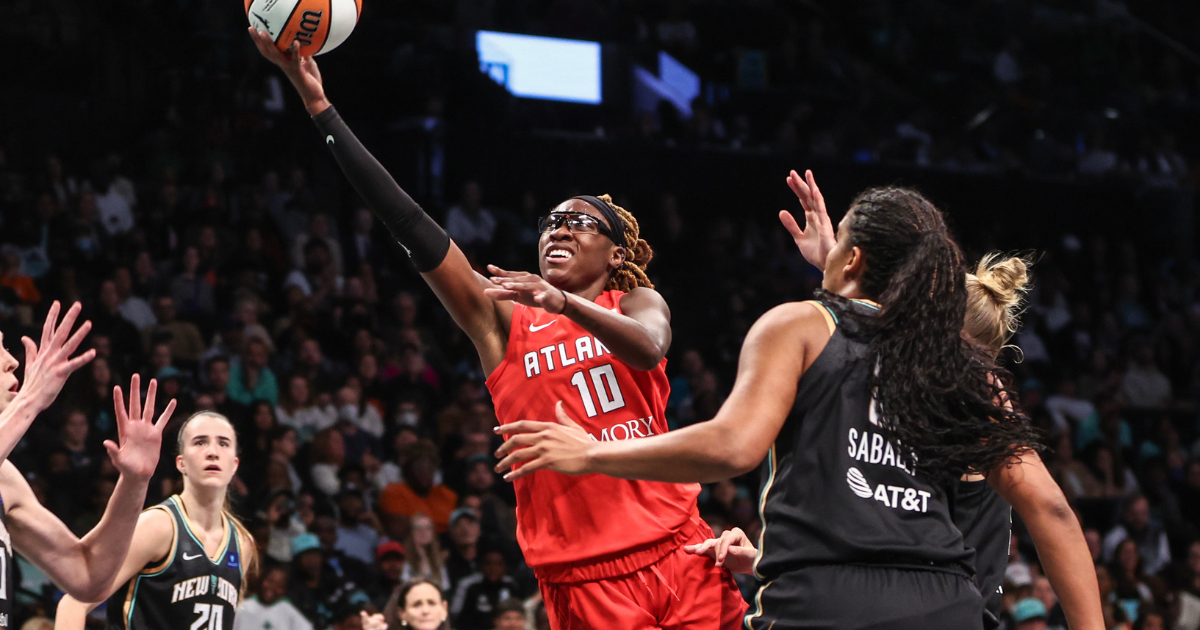Sep 24, 2024; Brooklyn, New York, USA; Atlanta Dream guard Rhyne Howard (10) drives past New York Liberty forward Nyara Sabally (8) during game two of the first round of the 2024 WNBA Playoffs at Barclays Center. Mandatory Credit: Wendell Cruz-Imagn Images
