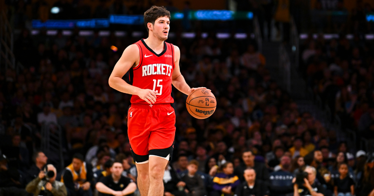 Apr 11, 2025; Los Angeles, California, USA; Houston Rockets guard Reed Sheppard (15) moves the ball against the Los Angeles Lakers during the second half at Crypto.com Arena. Mandatory Credit: Jonathan Hui-Imagn Images
