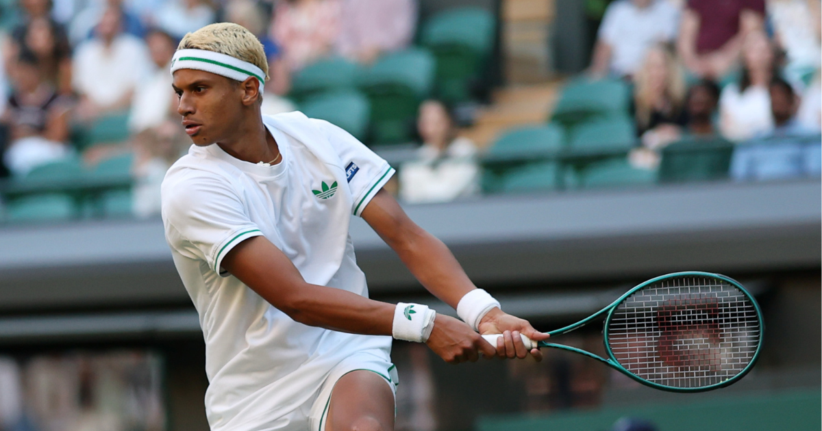 Jul 2, 2025; Wimbledon, United Kingdom; Gabriel Diallo (CAN) hits a backhand against Taylor Fritz (USA)(not pictured) on day three of The Championships Wimbledon 2025 at All England Lawn Tennis and Croquet Club. Mandatory Credit: Geoff Burke-Imagn Images