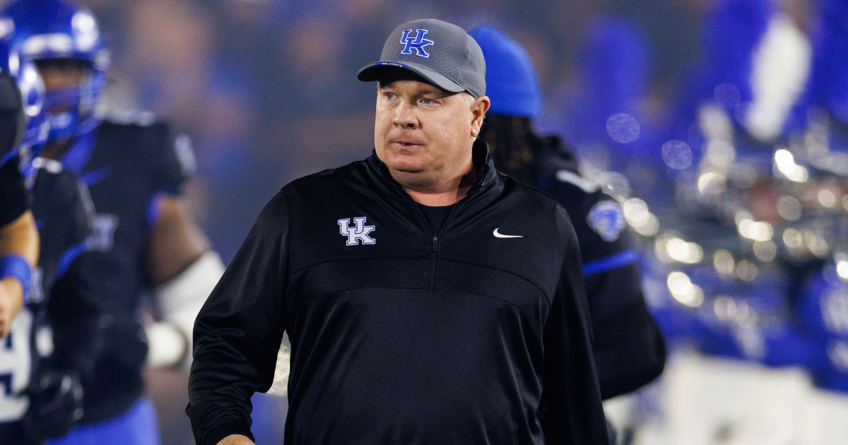 Kentucky Wildcats head coach Mark Stoops runs onto the field before a game against the Vanderbilt Commodores at Kroger Field. Mandatory Credit: Jordan Prather-Imagn Images